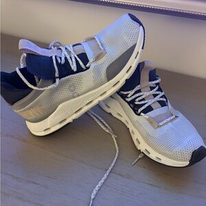 On Running Black and White Athletic Shoes